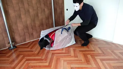 Escaping From A Bag Tied Up And Stuffed
