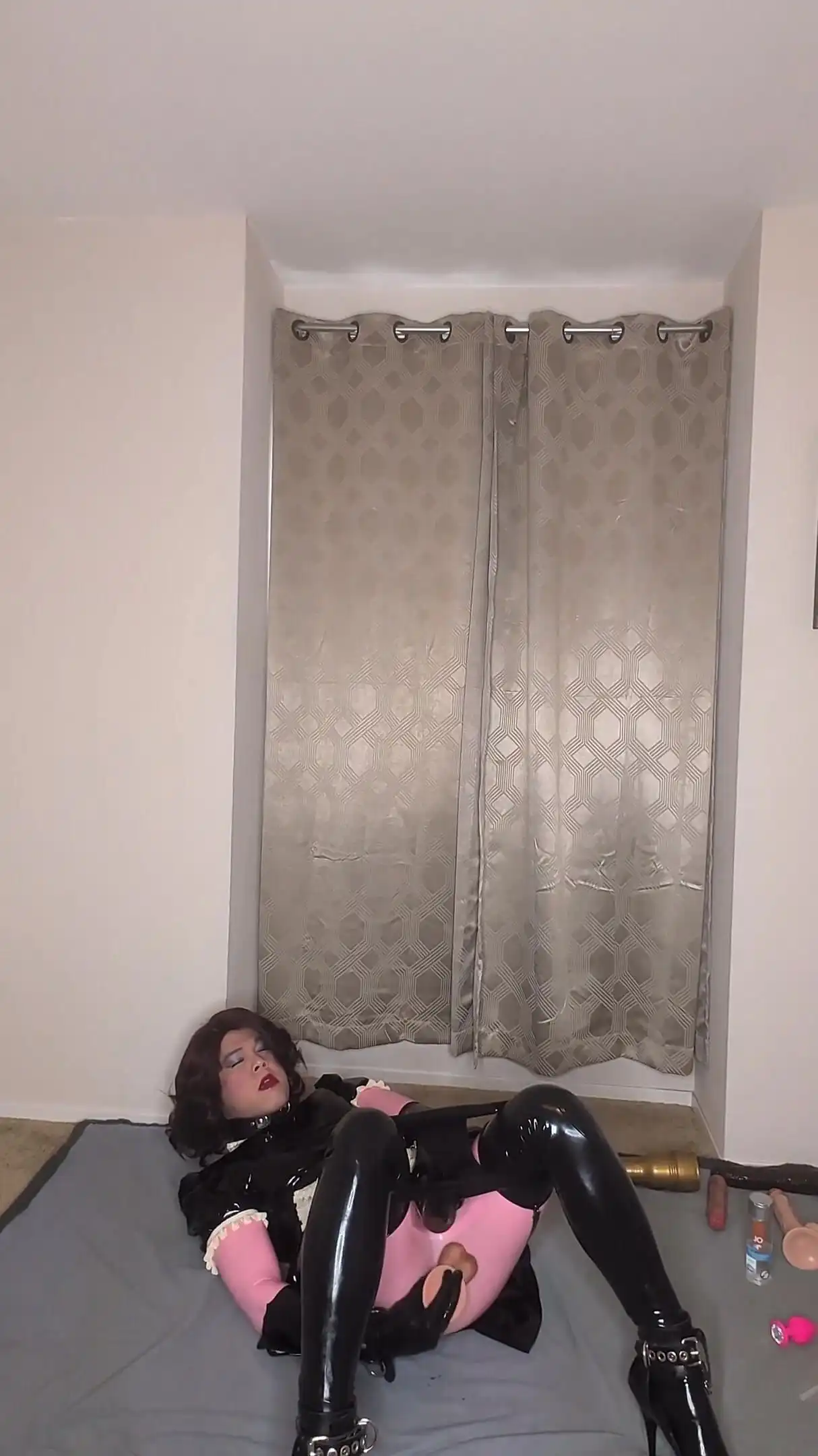 Latex Catsuit and Maid Dress Sissy Tries to Fuck Both of Her Holes with Dildos