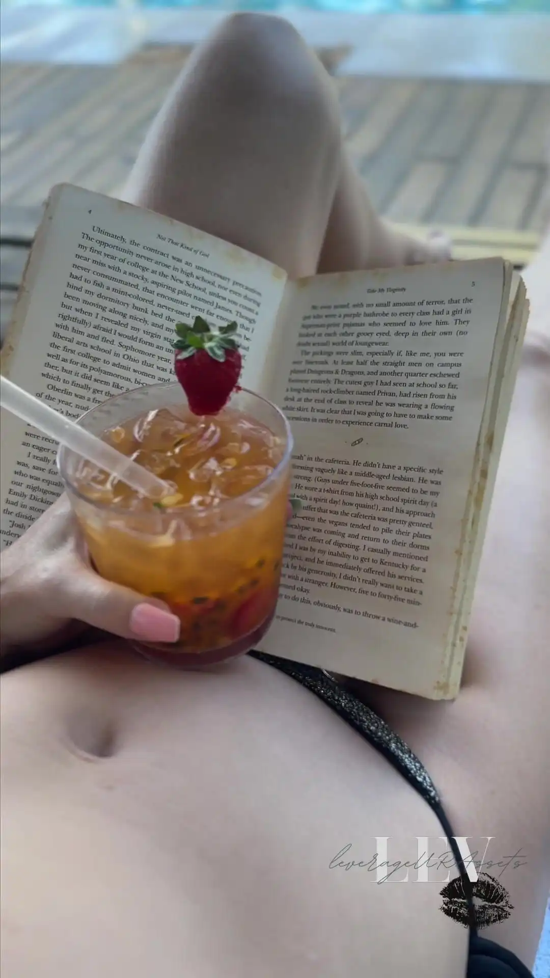Reading by the Pool in a Bikini That Barely Counts as Spf