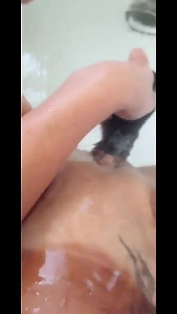 MILF Plays in the Tub with a Big Dildo
