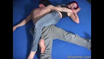 Red Headed Mistress Beats A Masked Man In A Mixed Wrestling