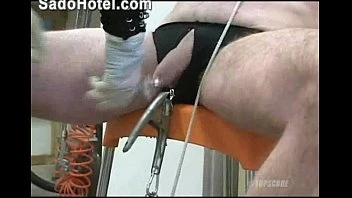 Mistress Putting A Gasmask On Slaves Face