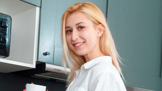 Blonde model Iris Kiss Kiss stimulates her pussy with love