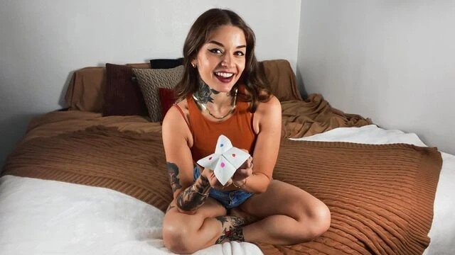 Cute-looking inked doll Vanessa Vega is playing with her little crack