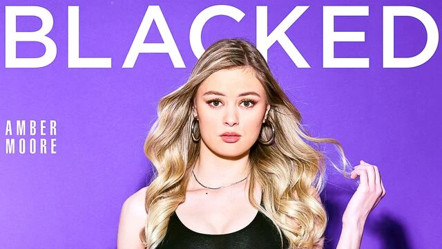 Awesome white model Amber Moore fucked by long black dick on cam
