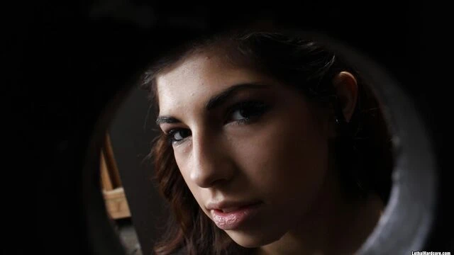 Slender teen Ava Taylor gives a hands free head in the gloryhole