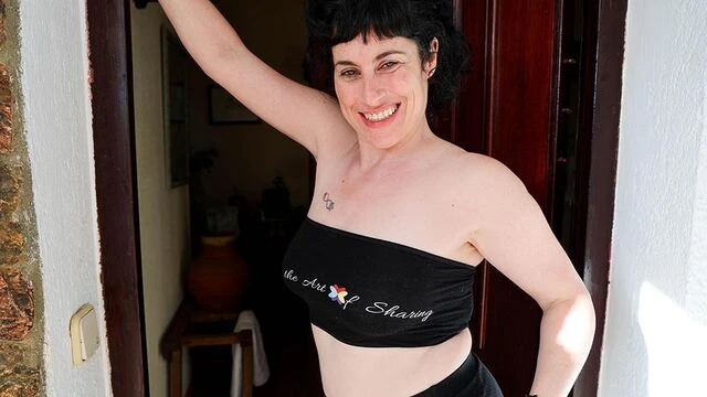 Awesome granny with big boobs Emmita Smile plays with her crack
